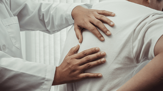 Physical therapist with a patient.