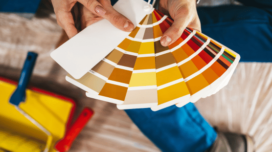 Home renovators looking at paint swatches.