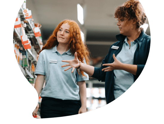 woman talking to young lady
