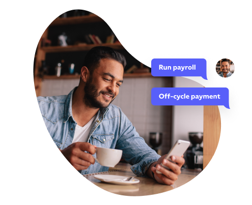Man smiling looking at phone