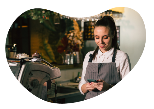 Woman smiling looking at phone