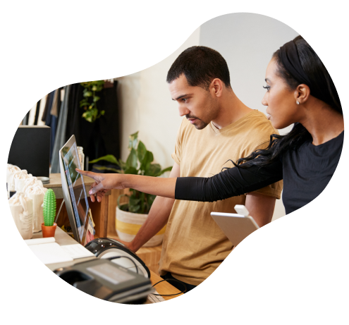 Man and woman looking at computer