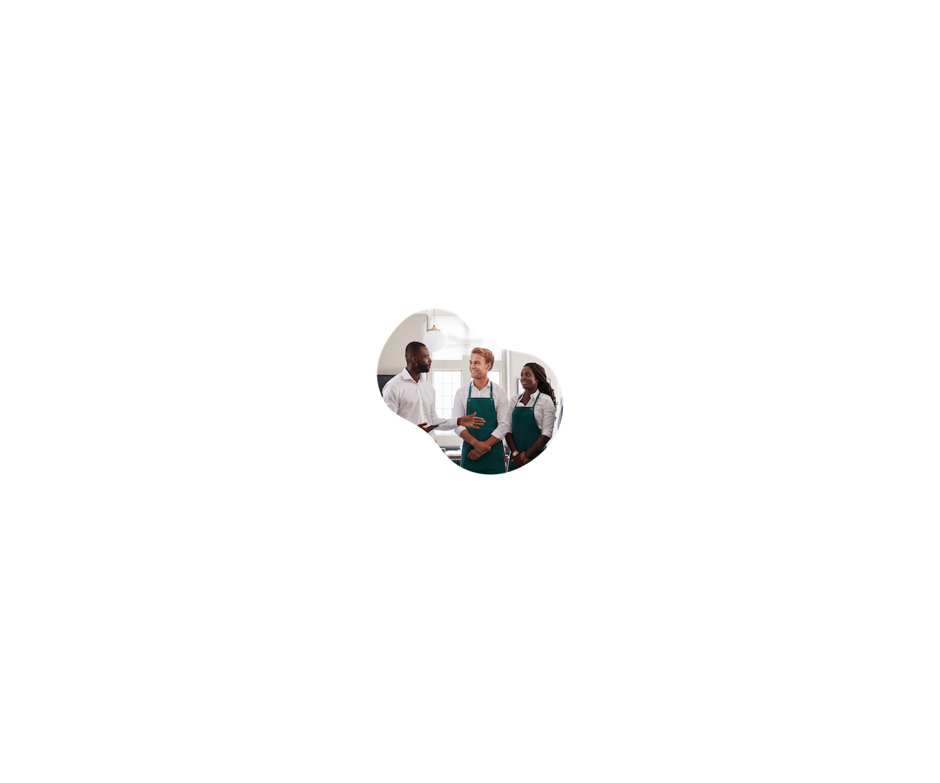 Person talking to two people wearing aprons