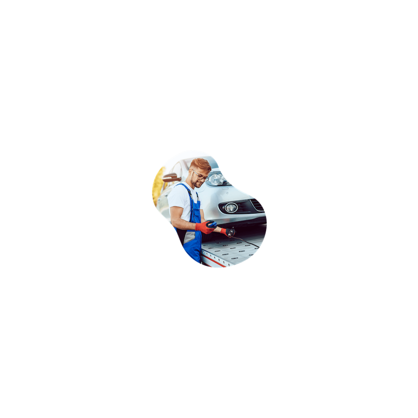 man working on car
