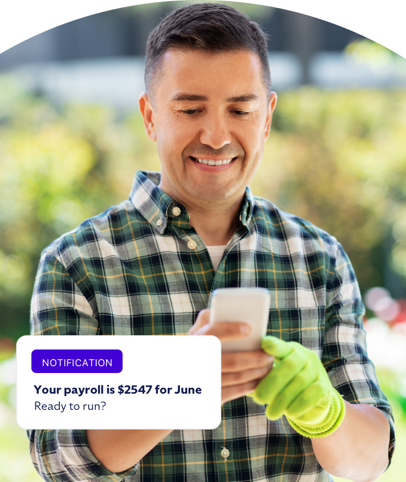 Person smiling at phone