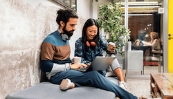 Man and woman set up small business payroll.